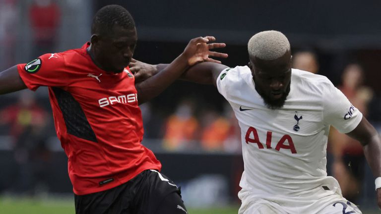 Rennes' Hamari Traore, left, challenges the ball to Tottenham's Tanguy Ndombele 