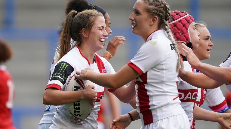 England v Wales - Women's International Match - Halliwell Jones Stadium
England's Tara Jones (left) celebrates scoring a try during the women's international match at the Halliwell Jones Stadium, Warrington. Picture date: Friday June 25, 2021.