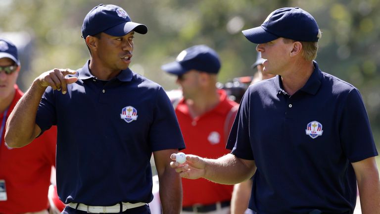 USA's Tiger Woods talks to Steve Stricker at the Ryder Cup PGA golf tournament Tuesday, Sept. 25, 2012, at the Medinah Country Club in Medinah, Ill. (AP Photo/Chris Carlson) 