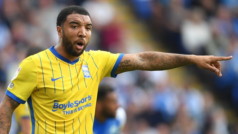 Troy Deeney urged professional footballers to report every instance of racist abuse