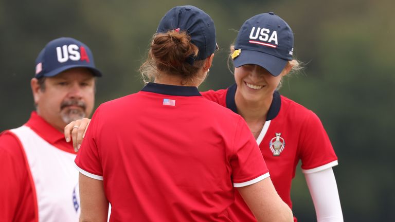 Nelly Korda of Team USA and Ally Ewing of Team USA react after winning their match during the Foursomes Match on day one of the Solheim Cup at the Inverness Club 