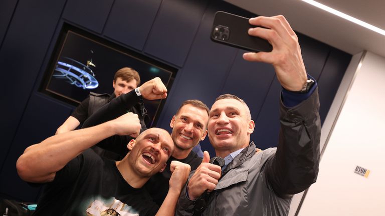 Anthony Joshua vs Oleksander Usyk, IBF, WBA, WBO and IBO Heavyweight World Title, Tottenham Hotspur Stadium, London..26 September 2021.Picture By Mark Robinson Matchroom Boxing..Andriy Shevchenko, Vitali Klitschko with Oleksander Usyk backstage after the fight. 