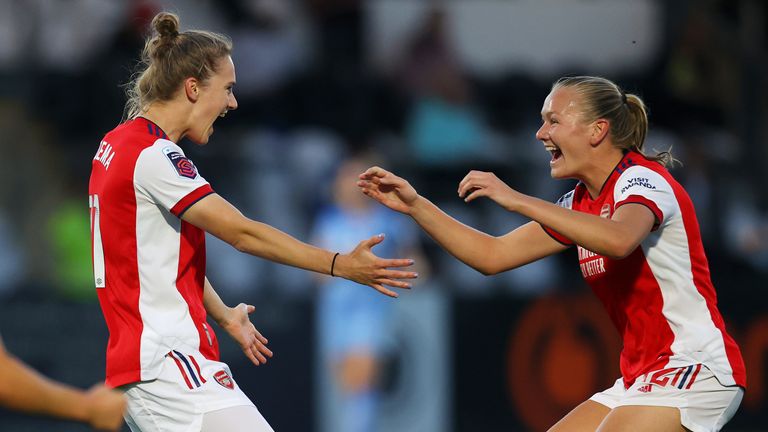 Goalscorer Vivianne Miedema celebrates with Frida Maanum after giving Arsenal the lead