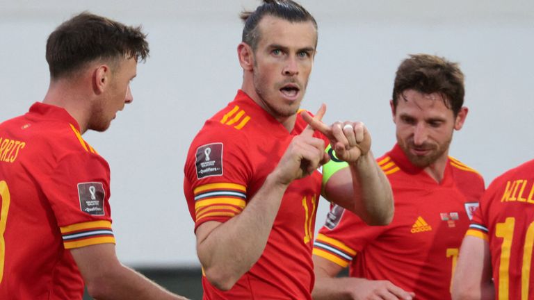 Gareth Bale celebrates his hat-trick after rescuing Wales in win over Belarus