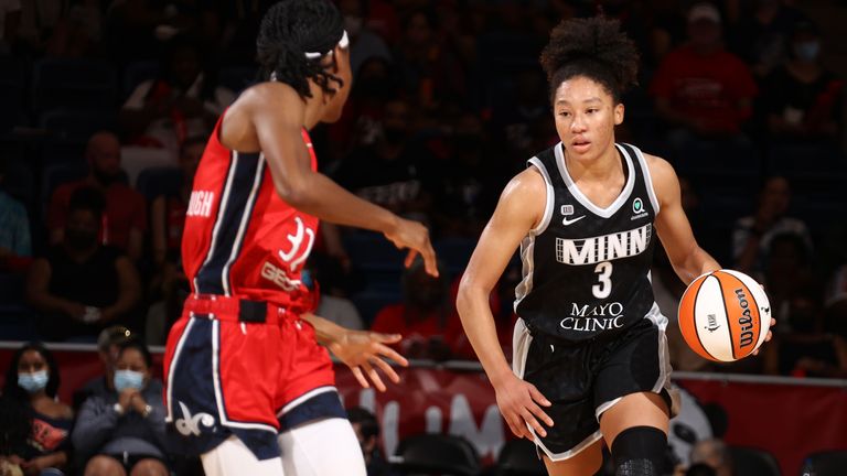 Aerial Powers dribbles the ball against the Washington Mystics