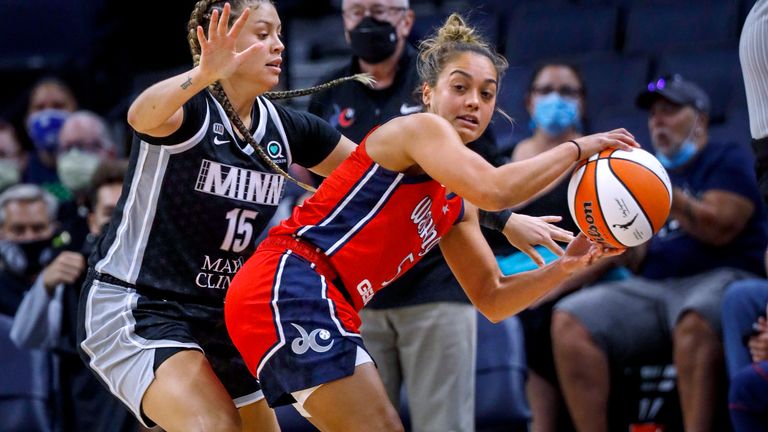 Minnesota Lynx guard Rachel Banham (15) defends against Washington Mystics guard Leilani Mitchell (5) during the first quarter of a WNBA basketball game Saturday, Sept. 4, 2021, in Minneapolis.