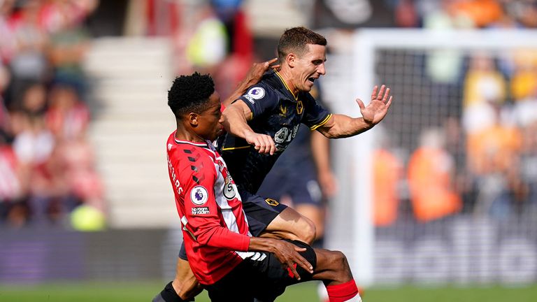 Wolverhampton Wanderers' Daniel Podence (right) is tackled by Southampton's Kyle Walker-Peters during the Premier League match at St. Mary's Stadium, Southampton.