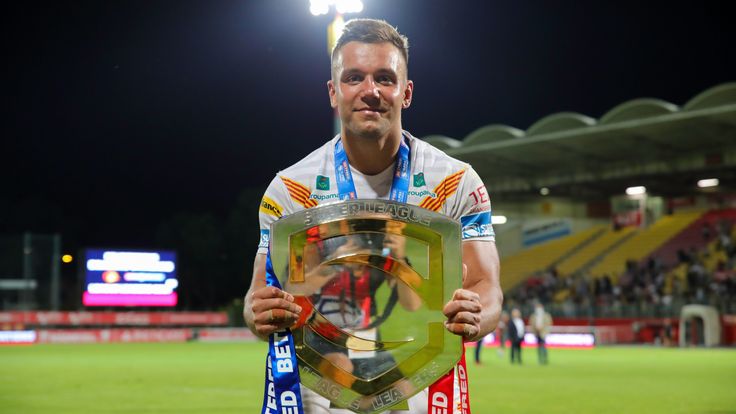 Picture by Laurent Selles/Catalan Dragons/SWpix.com - 11/09/21 - Rugby League - Betfred Super League Round 21 - Catalan Dragons v Huddersfield Giants - Stade Gilbert Brutus, Perpignon, France - Catalan Dragons' Mickael Goudemand with the Betfred League Leader's Shield.