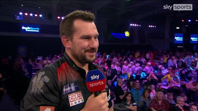 Jonny Clayton said he was struggling to relax in his match against Krzysztof Ratajski and was relieved to get through to the semi-finals of the Grand Prix.