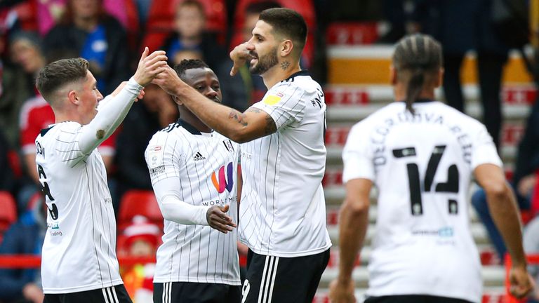 Aleksandar Mitrovic celebrates with his Fulham team-mates at Nottingham Forest