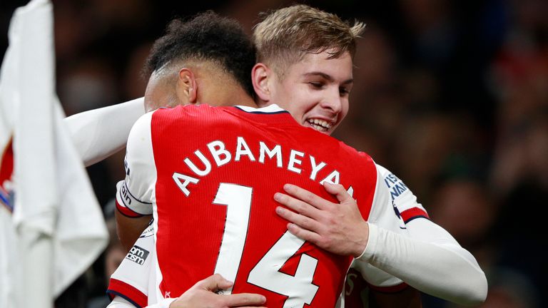 Arsenal's Emile Smith Rowe, right, celebrates with Arsenal's Pierre-Emerick Aubameyang after scoring his side's third goal during the Premier League match between Arsenal and Aston Villa at the Emirates 