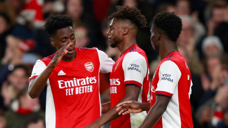 Arsenal players celebrate after Partey's opener