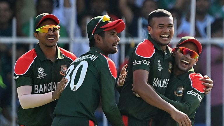 Taskin Ahmed of Bangladesh celebrates after running out Andre Russell of West Indies during the ICC Men's T20 World Cup match between West Indies and Bangladesh at Sharjah Cricket Stadium on October 29, 2021 in Sharjah