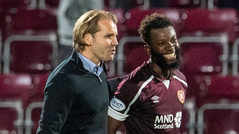 Hearts boss Robbie Neilson (left) believes Baningime will already be attracting interest after impressing since joining the club