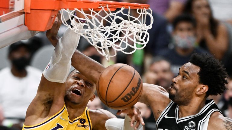 Russell Westbrook slammed home in overtime as the Los Angeles Lakers closed in on the win over the San Antonio Spurs.