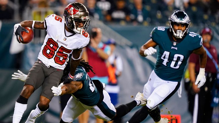 Tampa Bay Buccaneers wide receiver Jaydon Mickens runs with the ball as Philadelphia Eagles defensive back Andre Chachere tries to stop him