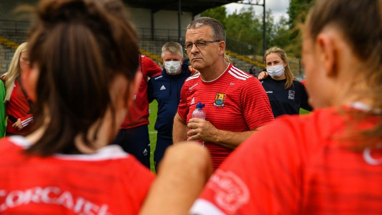 10 July 2021; Cork manager Ephie Fitzgerald listens to the Cork players after the TG4 All-Ireland Senior Ladies Football Championship Group 2 Round 1 match between Cork and Meath at St Brendan's Park in Birr, Offaly. Photo by Ray McManus/Sportsfile 