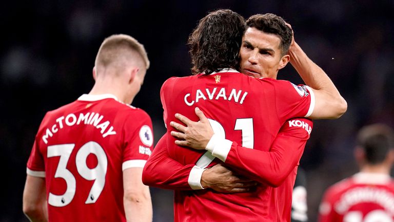 Cristiano Ronaldo embraces Edinson Cavani after Man Utd's second goal