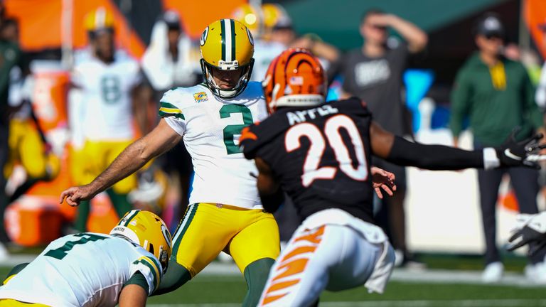 Green Bay Packers kicker Mason Crosby (2) misses a field goal from the hold of Corey Bojorquez in the second half of an NFL football game against the Cincinnati Bengals in Cincinnati, Sunday, Oct. 10, 2021.
