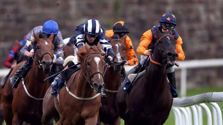 Dalanijujo and Ben Curtis (blue and white stripes) in action at Chester last year