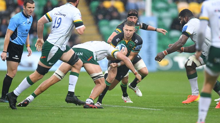 Dan Biggar is tackled by Adam Coleman