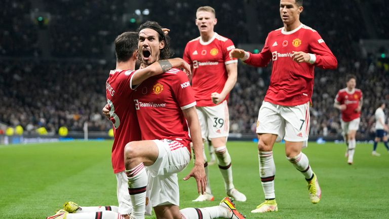 Edinson Cavani celebrates his goal with teammates Bruno Fernandes, Cristiano Ronaldo and Scott McTominay (AP)