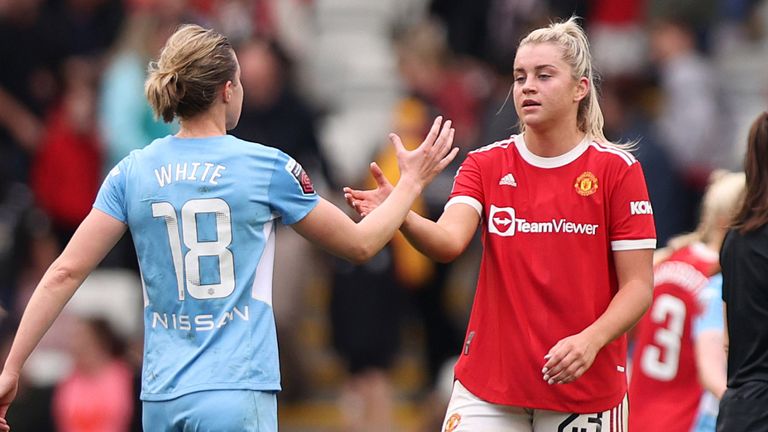 Ellen White and Alessia Russo congratulate one another at full-time in the Manchester derby