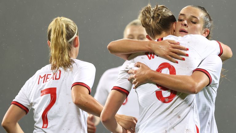 Ellen White celebrates scoring against Latvia