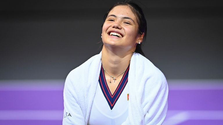 Emma Raducanu, of Britain, smiles after defeating Romania's Ana Bogdan at the Transylvania Open WTA tournament in Cluj, Romania, Thursday, Oct. 28, 2021. (AP Photo/Raed Krishan)