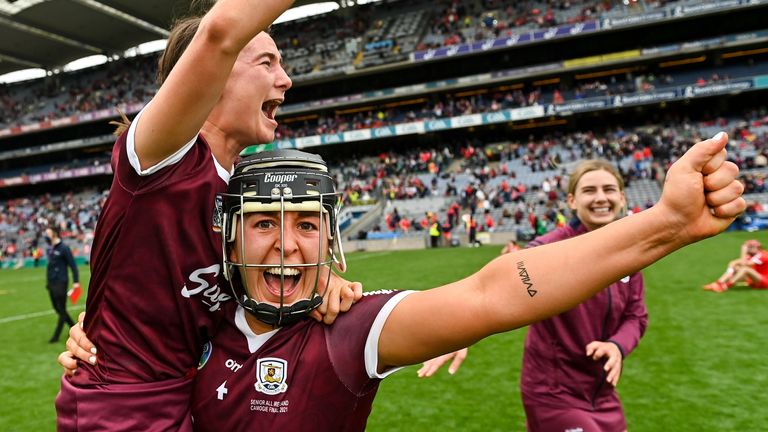 12 September 2021; Galway players Dervla Higgins, right, and Aoife Donoghue celebrate after their side's victory in the All-Ireland Senior Camogie Championship Final match between Cork and Galway at Croke Park in Dublin. Photo by Piaras .. M..dheach/Sportsfile