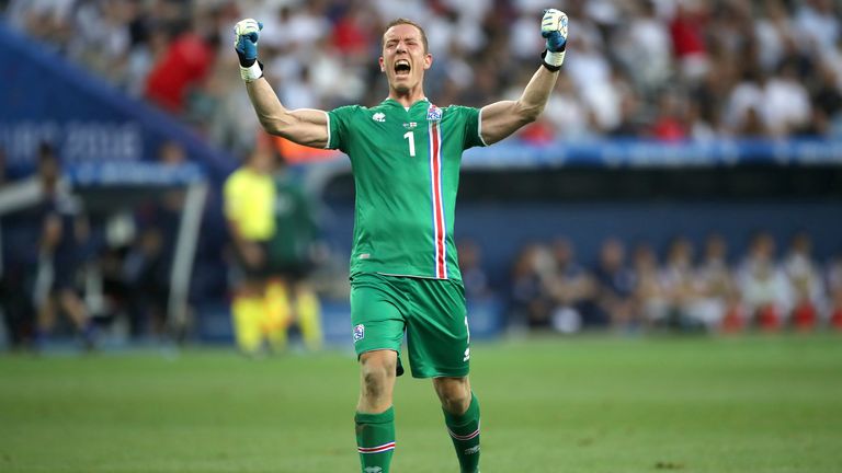 Hannes Thor Halldorsson celebrates Iceland's victory over England at Euro 2016