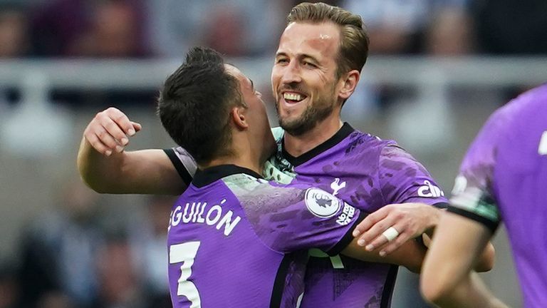 Tottenham&#39;s Harry Kane, centre, celebrates with Sergio Reguilon after scoring his side&#39;s second goal during an English Premier League soccer match between Newcastle and Tottenham Hotspur at St. James&#39; Park in Newcastle, England, Sunday Oct. 17, 2021. (AP Photo/Jon Super)