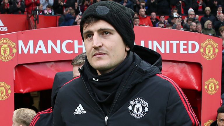 Harry Maguire of Manchester United walks out ahead of the Premier League match between Manchester United and Everton at Old Trafford on October 02, 2021 in Manchester, England. (Photo by Matthew Peters/Manchester United via Getty Images)