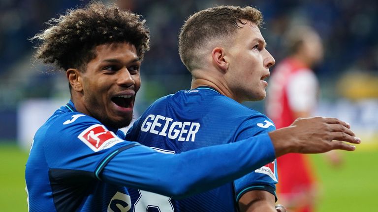 Dennis Geeker in Georgino Rutter praznujeta zmago Hoffenheima 