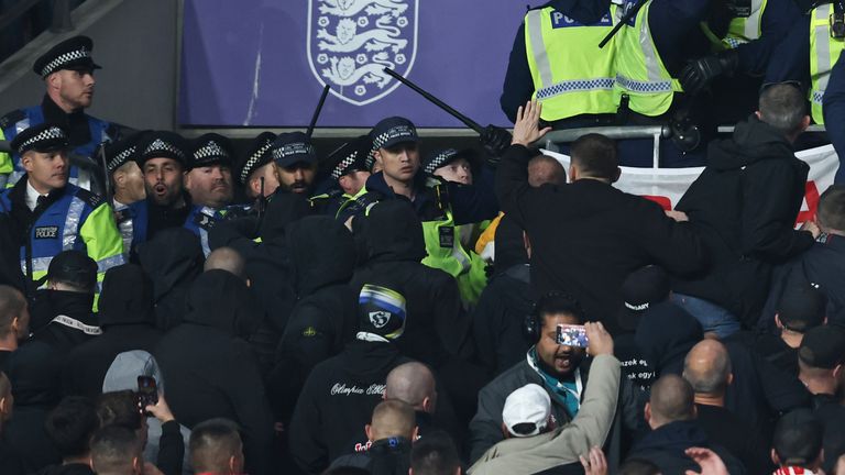Police intervene in the away end at Wembley during England vs Hungary