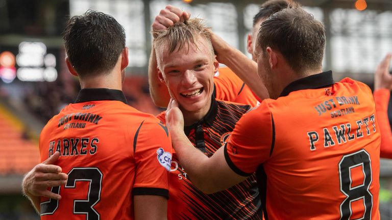 DUNDEE, SCOTLAND - OCTOBER 02: Goaslcorer Ilmari Niskanen is congratulated by his teammates after making it 1-0 during the cinch Premiership match between Dundee United and Ross County at Tannadice on October 02, 2021, in Dundee, Scotland. (Photo by Mark Scates / SNS Group)