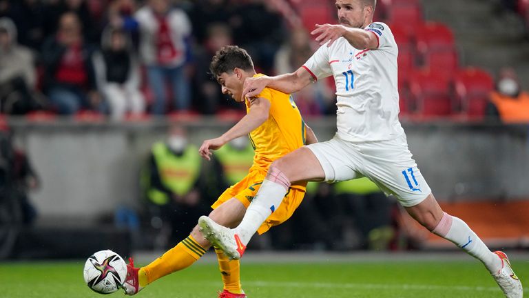 Wales Daniel James, left, scores his side's second goal during the World Cup 2022 group E qualifying soccer match between Czech Republic and Wales, at the Sinobo stadium in Prague, Czech Republic, Friday, Oct. 8, 2021. (AP Photo/Petr David Josek)