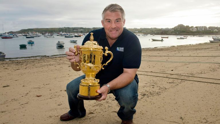 RFU President and Rugby World Cup 2003 winner, Jason Leonard with the Webb Ellis Cup on the Isles of Scilly as part of the 100 day Rugby World Cup Trophy Tour of the UK & Ireland. PRESS ASSOCIATION Photo. Picture date: Tuesday July 7, 2015. Photo credit should read: Hannah McKay/England Rugby 2015 via PA Wire