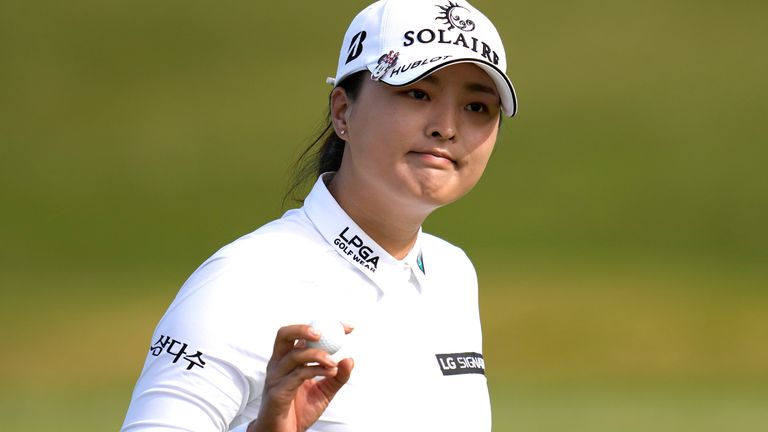 Jin Young Ko of South Korea reacts after making a putt on the ninth hole during the final round of the BMW Ladies Championship at LPGA International Busan in Busan, South Korea, Sunday, Oct. 24, 2021. (AP Photo/Lee Jin-man)