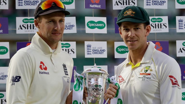 England&#39;s Joe Root, left, and Australia&#39;s Tim Paine hold the trophy during the presentation ceremony on the forth day of the fifth Ashes cricket test match between England and Australia at the Oval cricket ground in London, Sunday, Sept. 15, 2019. England won the fifth test by 135 runs to draw the series but Australia will retain the ashes trophy.(AP Photo/Kirsty Wigglesworth)