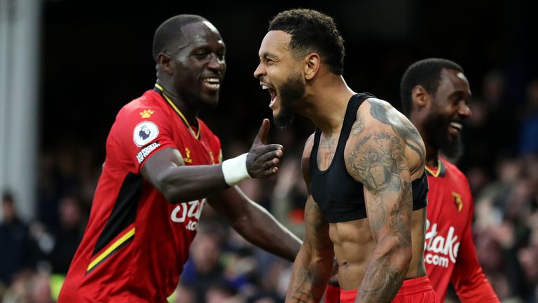 Joshua King celebrates scoring Watford's third goal