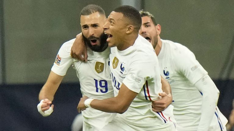 Karim Benzema and Kylian Mbappe celebrate in the Nations League final - AP Photo/Luca Bruno