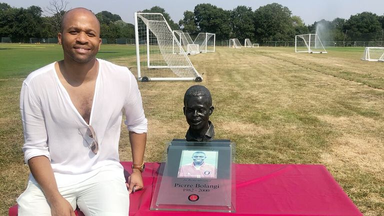 Kevin George with the memorial to former Charlton Athletic youth-team player Pierre Bolangi