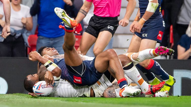Picture by Allan McKenzie/SWpix.com - 09/10/2021 - Rugby League - Betfred Super League Grand Final - Catalans Dragons v St Helens - Old Trafford, Manchester, England - St Helens's Kevin Naiqama scores a try against Catalans.