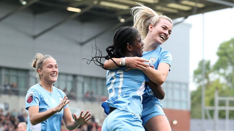 Man City's Khadija Shaw celebrates with team-mate Lauren Hemp after scoring against Man Utd