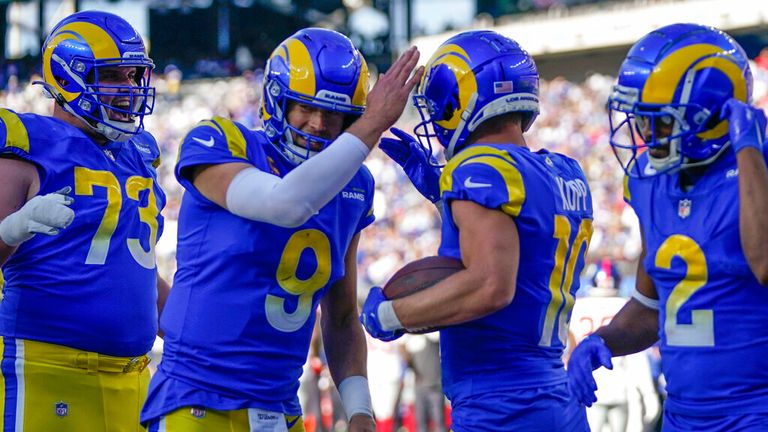 Los Angeles Rams&#39; Cooper Kupp, second from right, celebrates his touchdown with quarterback Matthew Stafford (9), second from left, during the second half of an NFL football game against the New York Giants, Sunday, Oct. 17, 2021, in East Rutherford, N.J. (AP Photo/Frank Franklin II)