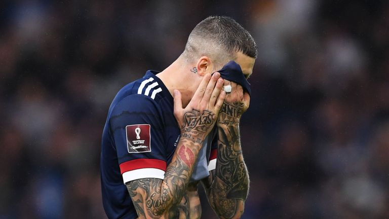 Scotland's Lyndon Dykes after missing a penalty