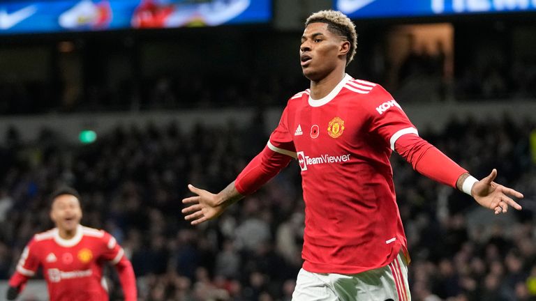 Marcus Rashford celebrates after scoring Man Utd's third goal (AP)