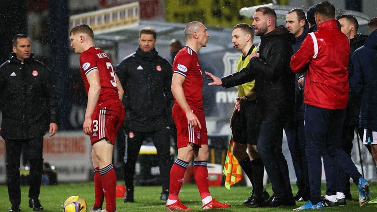 Aberdeen's Scott Brown (left) exchanges words with Dundee manager James McPake  during a cinch Premiership match between Dundee and Aberdeen at the Kilmac Stadium at Dens Park, on October 16, 2021, in Dundee, Scotland.  (Photo by Alan Harvey / SNS Group)