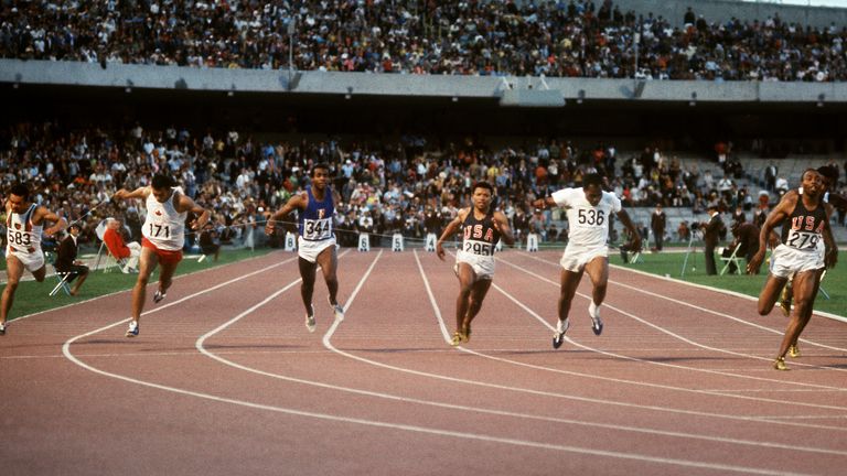 Jim Hines (R) crosses victoriously the finish line of the Olympics men's 100m final, clocking a time of 9.9, 14 October 1968 in Mexico City. From L to R : Madagascan Jean-Louis Ravelomanantsoa, Canadian Harry Jerome, French Roger Bambuck (5th), U.S Mel Pender (6th), Jamaican Lennox Miller (2nd-silver), U.S Jim Hines (1st-gold).